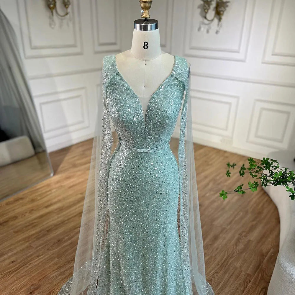 Vestido de noche árabe estilo sirena turquesa estilo Dubái con elegantes mangas de capa con cuentas de lujo para fiesta femenina 2025 LA72574 
