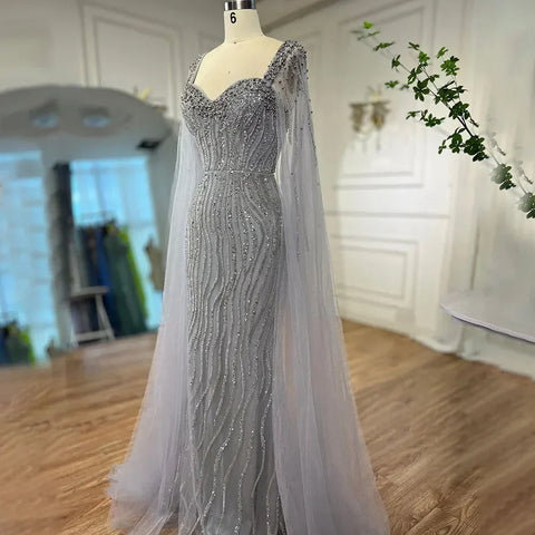 Vestido de noche de sirena azul árabe de lujo con cuentas y mangas tipo capa LA71715 