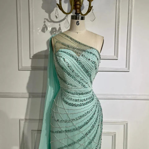 Robe de soirée sirène asymétrique turquoise plume avec cape LA72399