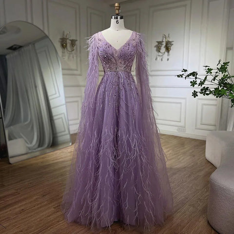 Robe de soirée trapèze couleur chair à plumes et manches cape LA72304