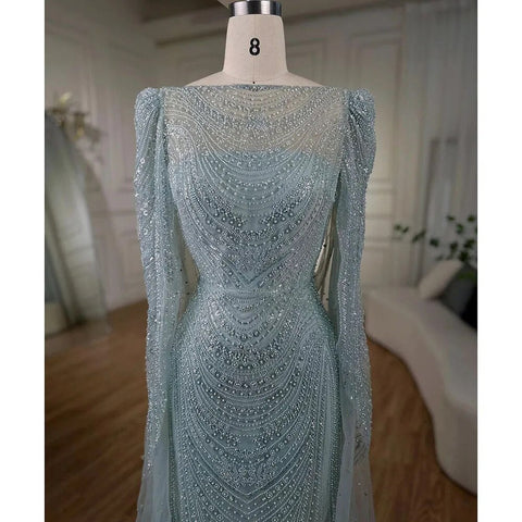 Vestidos de noche árabes de sirena con mangas de capa turquesa y cuentas de lujo para mujer, para fiesta de bodas 2025 LA72185 