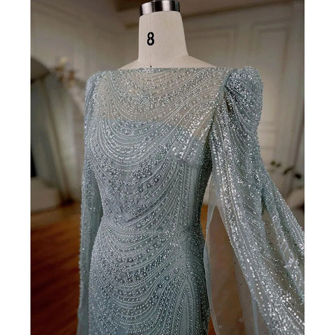 Vestidos de noche árabes de sirena con mangas de capa turquesa y cuentas de lujo para mujer, para fiesta de bodas 2025 LA72185 