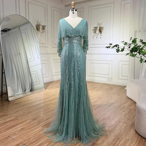 Elegante vestido de noche estilo sirena turquesa con capa larga y cuentas de lujo estilo Dubái para mujer, ideal para bodas y fiestas 2025 LA72258 