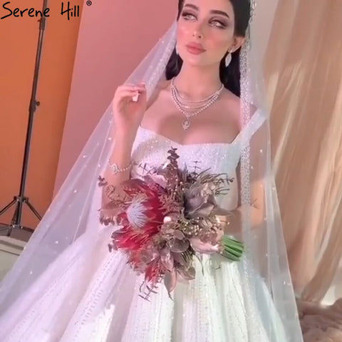 Vestidos de novia blancos de lujo y sexys 2025 con tirantes finos y cuentas, vestidos de novia de alta gama HA2468 hechos a medida 