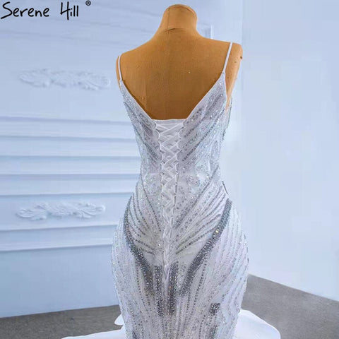 Vestido de novia elegante de lujo con volantes blancos y cuentas, corte sirena y tirantes finos, HM67386, 2025 