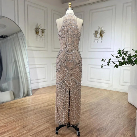 Vestidos de noche elegantes de sirena con cuello halter, sin mangas y cuentas de perlas color nude plateado 2025 para mujer LA72091 