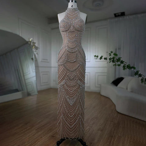 Vestidos de noche elegantes de sirena con cuello halter, sin mangas y cuentas de perlas color nude plateado 2025 para mujer LA72091 