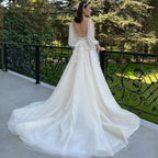 Robe de mariée sexy à décolleté plongeant en V, coupe trapèze, manches 3/4, dos nu, tulle et dentelle appliqués, style bohème, sur mesure