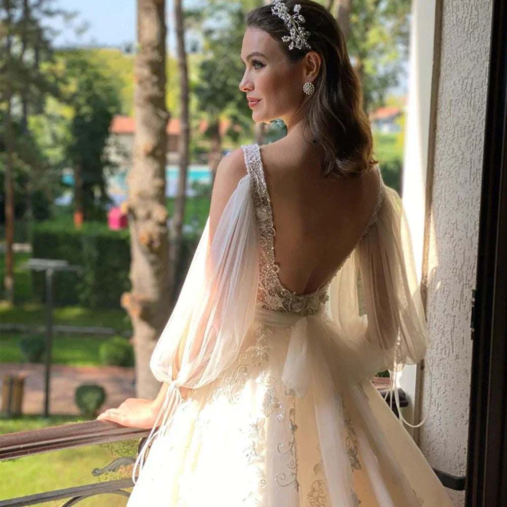 Robe de mariée sexy à décolleté plongeant en V, coupe trapèze, manches 3/4, dos nu, tulle et dentelle appliqués, style bohème, sur mesure
