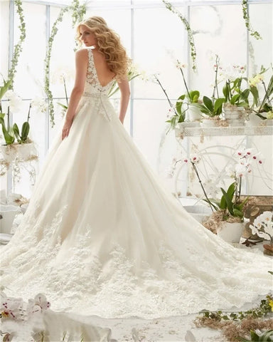 Vestidos de novia de encaje sexy con cola larga, sencillos, largos hasta el suelo, con mangas largas, apliques, cordones y espalda descubierta. 