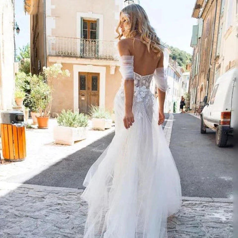 Vestidos de novia sexys con hombros descubiertos, estilo bohemio, de tul, elegantes, con abertura lateral, corte en A, apliques de encaje, ideales para la playa. Sin mangas.
