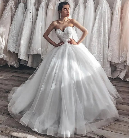 Vestido de novia sexy de tul con escote corazón, sin mangas, espalda descubierta, corte princesa, con espalda con cordones