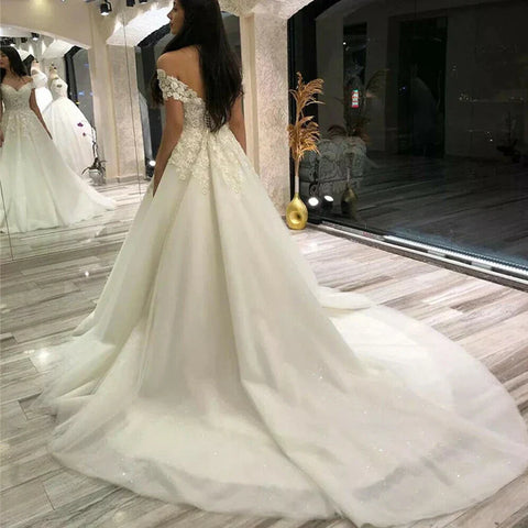 Vestido de novia sexy con escote en V, encaje y hombros descubiertos con apliques de encaje. Vestidos de novia 2024. Vestidos de novia para mujer.
