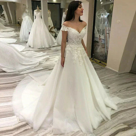 Vestido de novia sexy con escote en V, encaje y hombros descubiertos con apliques de encaje. Vestidos de novia 2024. Vestidos de novia para mujer.