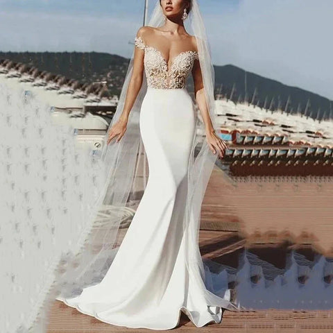 Vestidos de novia vintage con apliques de encaje, vestidos de sirena sexys con hombros descubiertos, vestidos de baile estilo imperio en satén, vestidos formales para novias y fiestas en la playa.