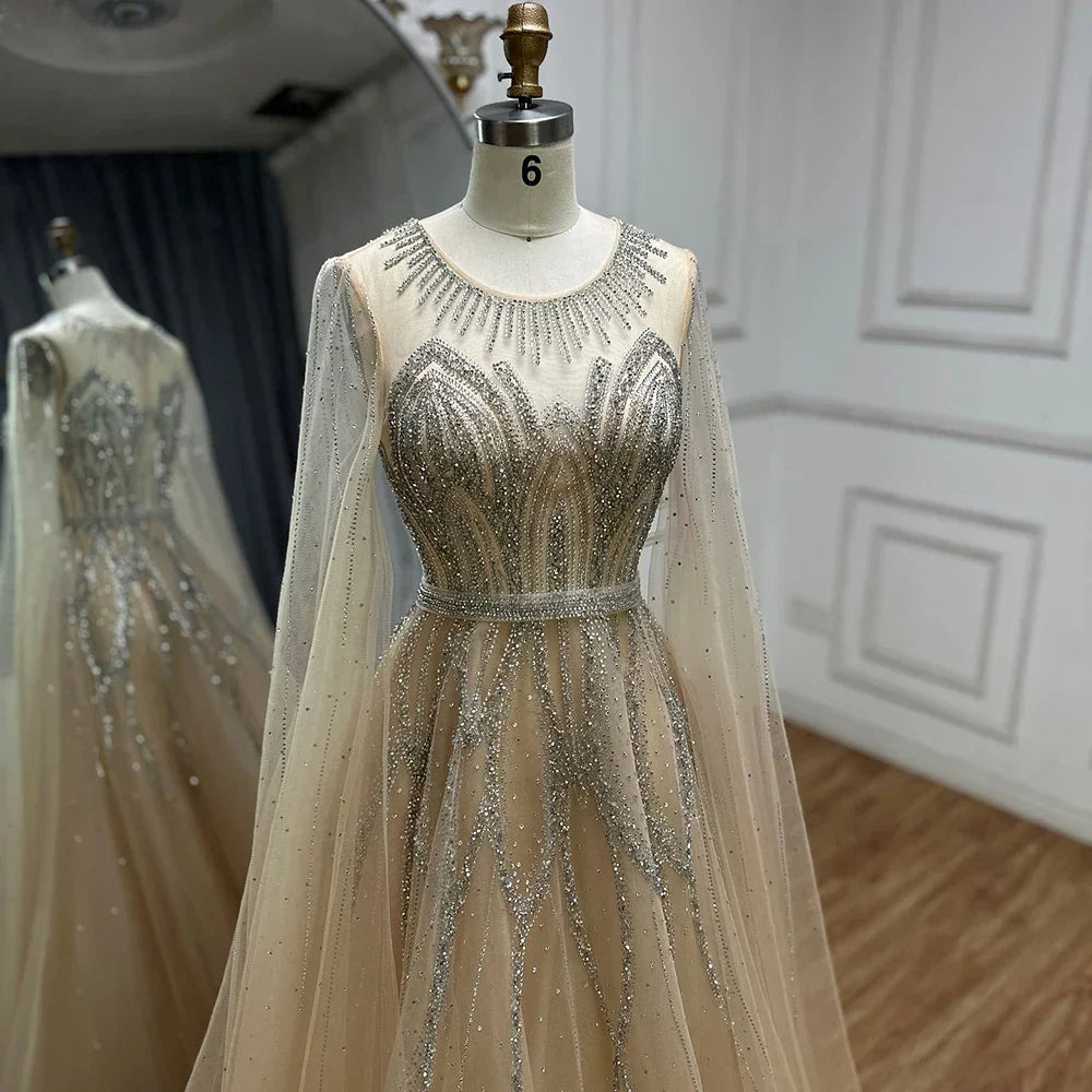 Vestido largo de noche árabe elegante, corte en A, con cuentas, color azul nude, mangas tipo capa, ideal para ocasiones formales (LA72785) 
