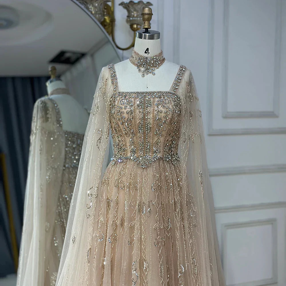 Vestido de noche de lujo saudí LA72764, corte A, manga capa, con cuentas de cristal, estilo árabe, color nude, ideal para ocasiones formales (modelo 2025).