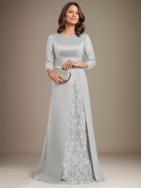 Robe de mère de la mariée en satin de dentelle, coupe trapèze, longue jusqu'au sol, ornée d'appliqués, avec décolleté plongeant et bretelles.