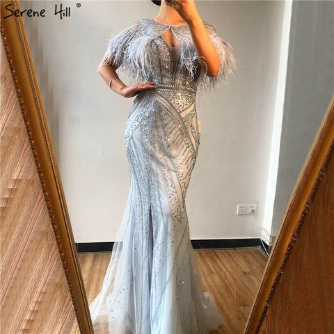 On Sale no return no refundSale Silver Feathers Shawl Yarn Sexy Evening Dresses 2025 Dubai Mermaid V-Neck Beading Diamond Formal Dress LA70355