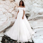 Robe de mariée bohème simple en forme de A, sexy, épaules dénudées, en tulle plissé blanc, idéale pour la plage, les bals de fin d'année et les mariages (collection 2023).