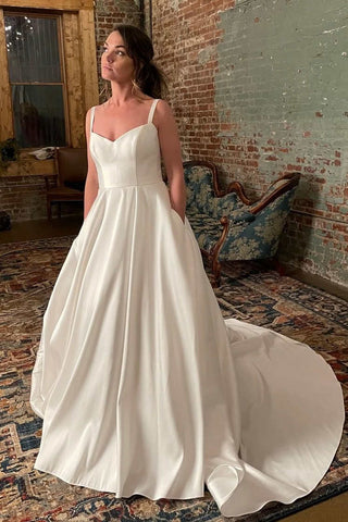 Robe de mariée ivoire à bretelles larges et poches, modèle WD633