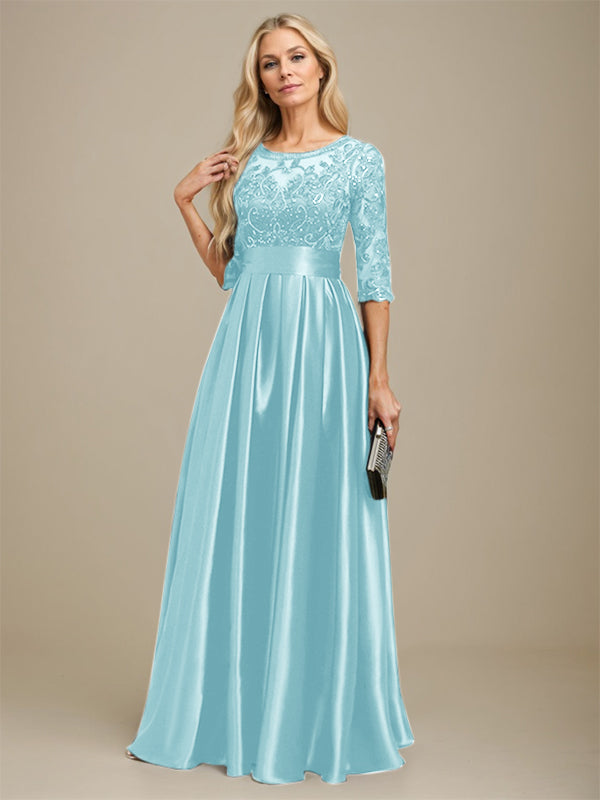 Robe de mariée longue en satin stretch dentelle et dentelle, coupe trapèze, décolleté illusion, ornée d'un nœud à sequins 