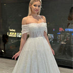 Vestidos de novia nuevos con encaje brillante, escote corazón y hombros descubiertos, espalda descubierta, hermosos apliques y cola de barrido. 