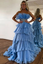 Elegante vestido de fiesta largo azul sin tirantes, corte en A y con volantes, con cinturón PSK483
