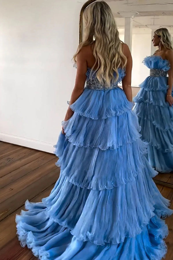Elegante vestido de fiesta largo azul sin tirantes, corte en A y con volantes, con cinturón PSK483