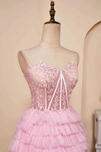 Robe de bal rose bustier à encolure cœur et volants PD514