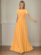 Robe en mousseline de soie bleu marine foncé, coupe trapèze, col bateau et sequins 