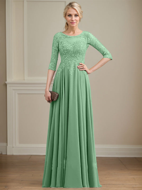 Vestido de novia de corte A, escote redondo, ilusión, largo hasta el suelo, de encaje y gasa con lentejuelas. 