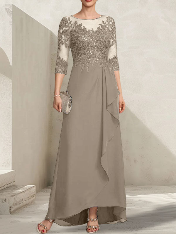 Vestido de madrina de la novia, corte asimétrico, escote ilusión, encaje y gasa, con lentejuelas y volantes en cascada.