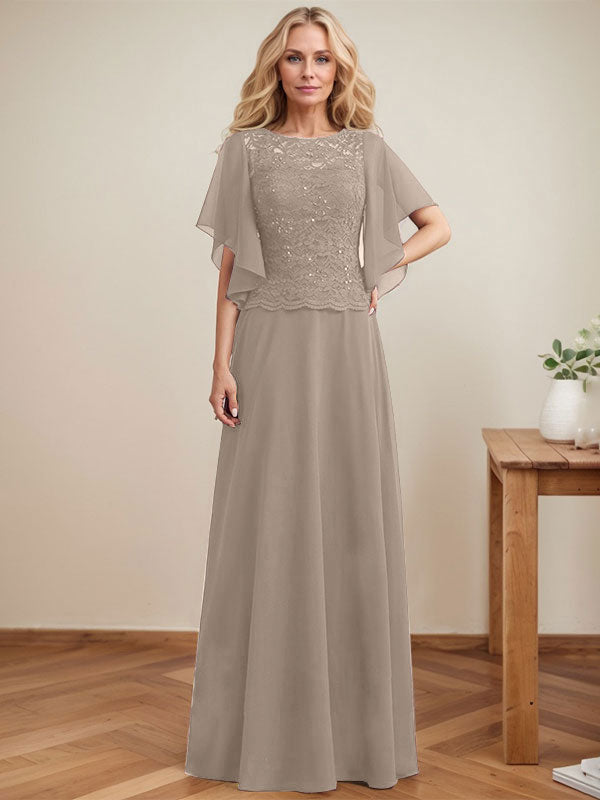 Vestido de novia de corte A, escote redondo, ilusión, largo hasta el suelo, de encaje y gasa con lentejuelas. 