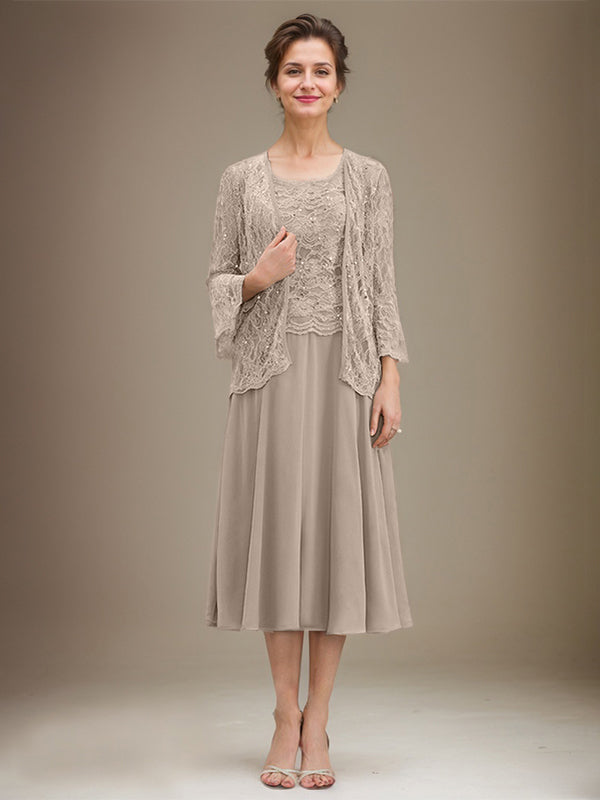 Vestido de novia de corte línea A, escote redondo, largo hasta la rodilla, de encaje y gasa con lentejuelas. 