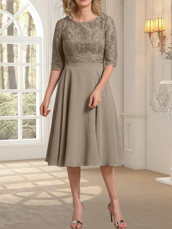 Vestido de novia de gasa de encaje, corte en A, escote redondo y largo hasta la rodilla.