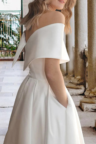 Vestido de novia playero de satén con hombros descubiertos y largo hasta la rodilla, con bolsillos WD680