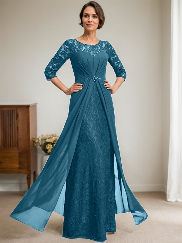 Vestido de novia de corte línea A, escote redondo ilusión, largo hasta el suelo, de gasa de encaje con volantes y pedrería. 