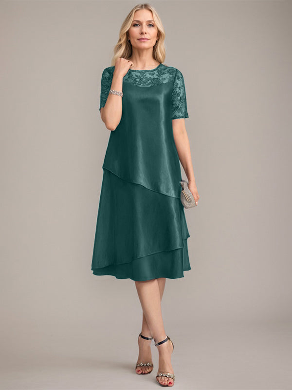Vestido de corte A, escote redondo, largo hasta la rodilla, para la madre de la novia, con apliques y lentejuelas. 