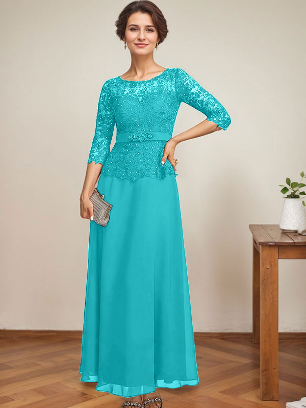 Vestido de novia corte A, escote redondo ilusión, largo hasta el tobillo, de gasa y encaje, con pedrería y detalles de diamantes de imitación. 