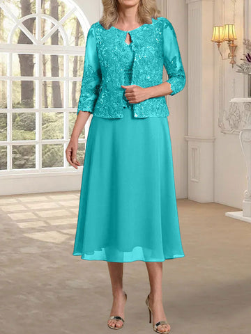 Vestido de novia de corte línea A, escote redondo, largo hasta la rodilla, de encaje y gasa con lentejuelas. 