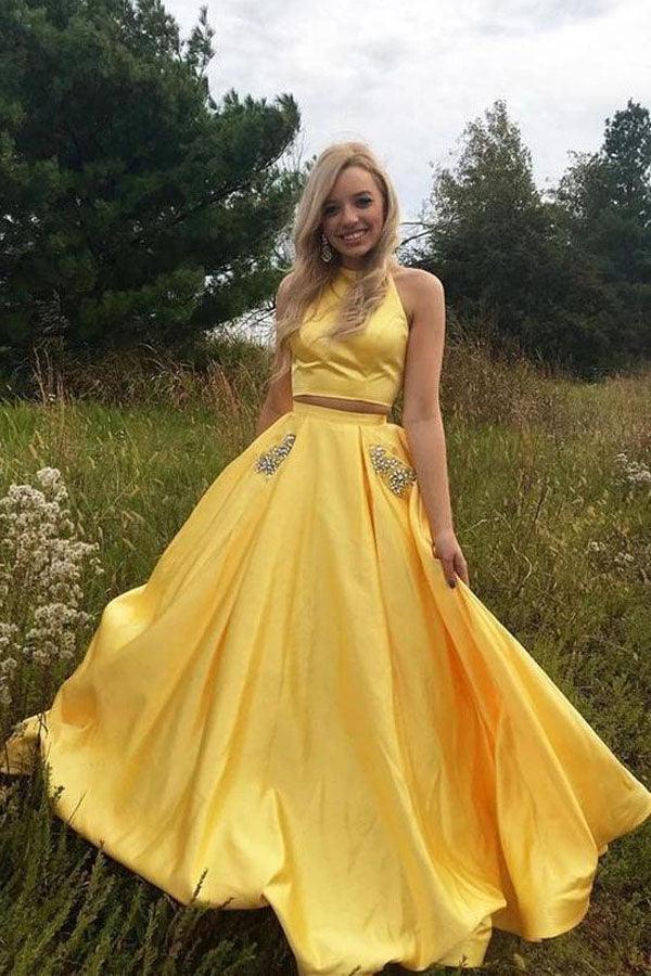 Robe de bal longue deux pièces en satin à col halter et poche ornée de perles