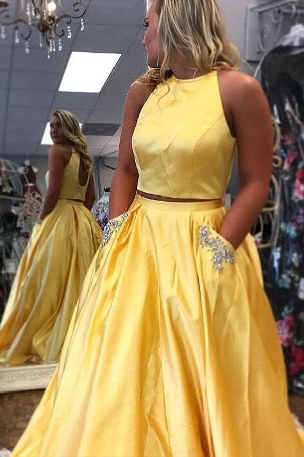 Robe de bal longue deux pièces en satin à col halter et poche ornée de perles