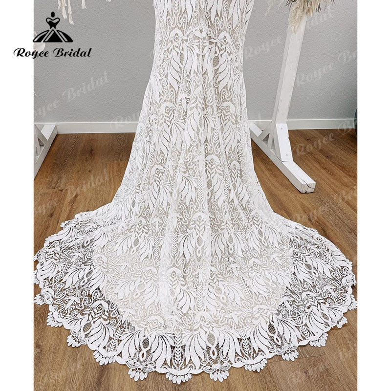 Robe de mariée bohème à bretelles spaghetti pour femmes, en dentelle, dos nu, style sirène/trompette, col en V