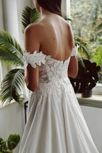 Vestido de novia largo vintage blanco, corte en A, con hombros descubiertos y abertura