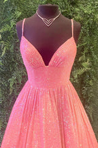 Robe de bal longue trapèze à fines bretelles et sequins