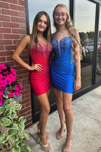 Robe de bal tendance bleu roi à bretelles spaghetti et corset ornée de perles