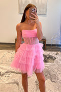 Robe de bal bustier en tulle à volants et corset à sequins