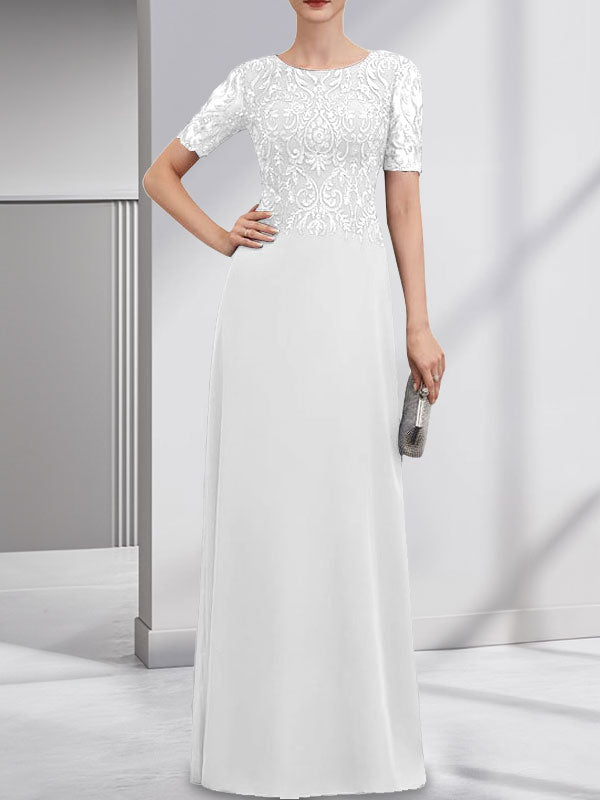 Vestido de novia de corte línea A, escote redondo, largo hasta el suelo, de encaje y gasa con lentejuelas.