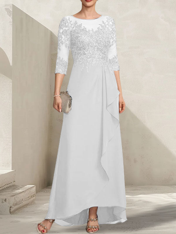 Vestido de madrina de la novia, corte asimétrico, escote ilusión, encaje y gasa, con lentejuelas y volantes en cascada.